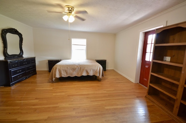 1355 Westfield Rd, Dickson, TN 37055 - bedroom with multiple windows, crown molding, light wood-type flooring, a textured ceiling, and a ceiling fan