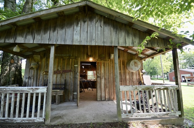 1355 Westfield Rd, Dickson, TN 37055 - view of exterior entry with board and batten siding