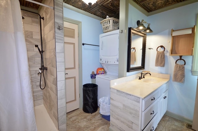 1355 Westfield Rd, Dickson, TN 37055 - full bath with stacked washing machine and dryer, vanity, and tiled shower
