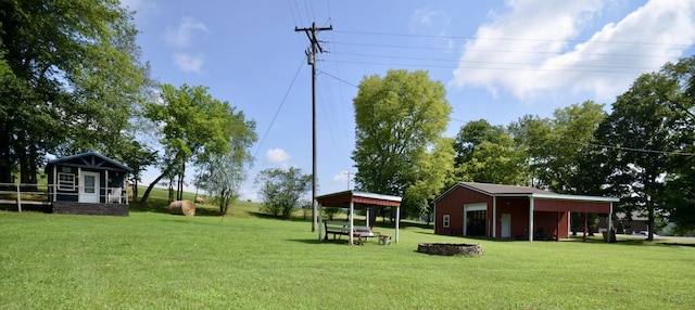 1355 Westfield Rd, Dickson, TN 37055 - view of home's community featuring an outbuilding, a detached garage, and a yard
