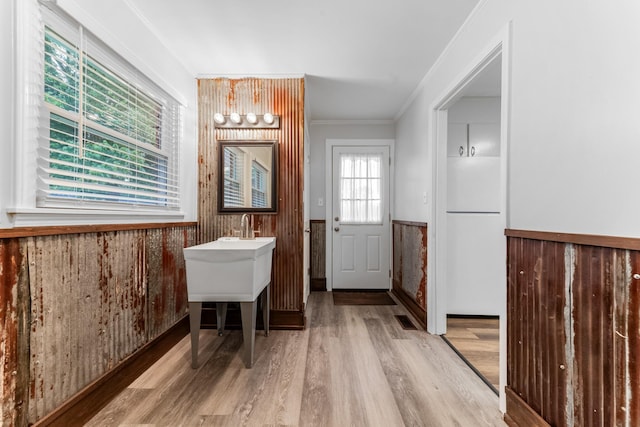 1200 Mill St, Pulaski, TN 38478 - bathroom with a wainscoted wall, wood finished floors, crown molding, a chandelier, and vanity