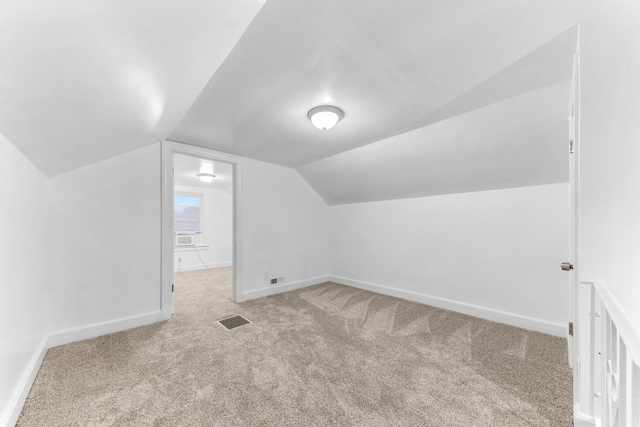 1200 Mill St, Pulaski, TN 38478 - additional living space featuring carpet floors and vaulted ceiling
