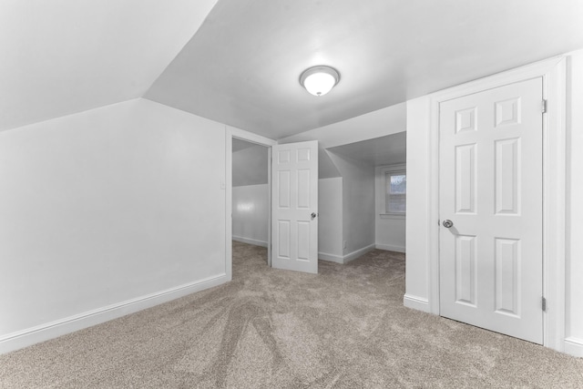 1200 Mill St, Pulaski, TN 38478 - additional living space featuring carpet flooring and vaulted ceiling