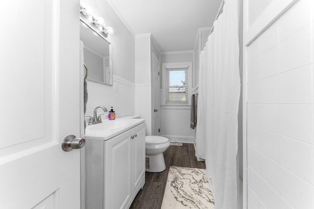 1200 Mill St, Pulaski, TN 38478 - bathroom with vanity, wood finished floors, ornamental molding, and curtained shower