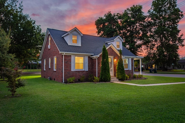 1200 Mill St, Pulaski, TN 38478 - new england style home featuring brick siding, a front yard, and a shingled roof