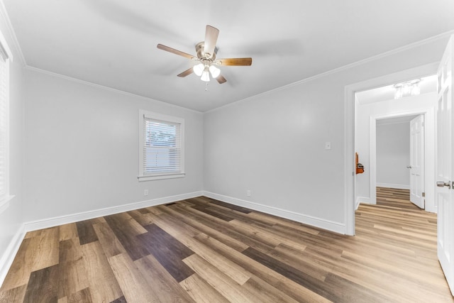 1200 Mill St, Pulaski, TN 38478 - spare room with ceiling fan, wood finished floors, and crown molding