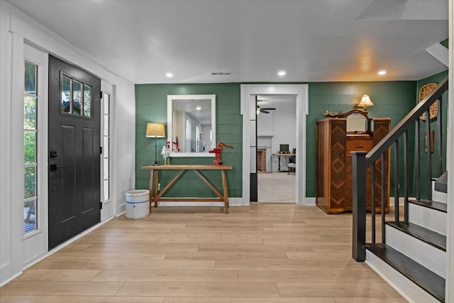 1030 Upper Creek Rd, Vanleer, TN 37181 - foyer entrance featuring stairs, wood finished floors, a ceiling fan, and recessed lighting