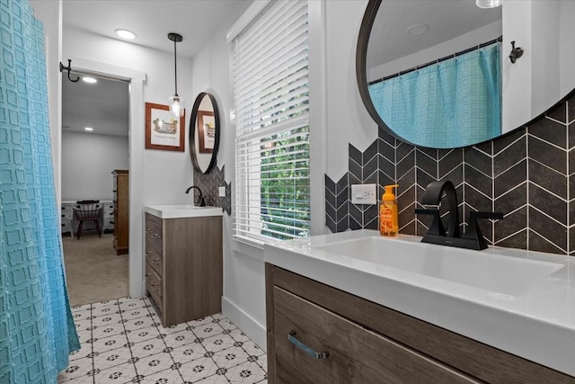1030 Upper Creek Rd, Vanleer, TN 37181 - bathroom featuring two vanities, backsplash, tile patterned floors, and recessed lighting