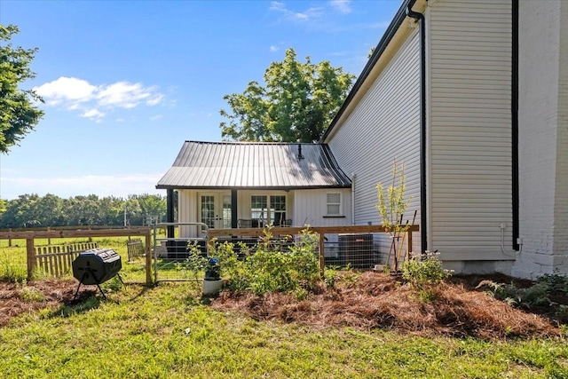 1030 Upper Creek Rd, Vanleer, TN 37181 - rear view of house featuring french doors and a metal roof