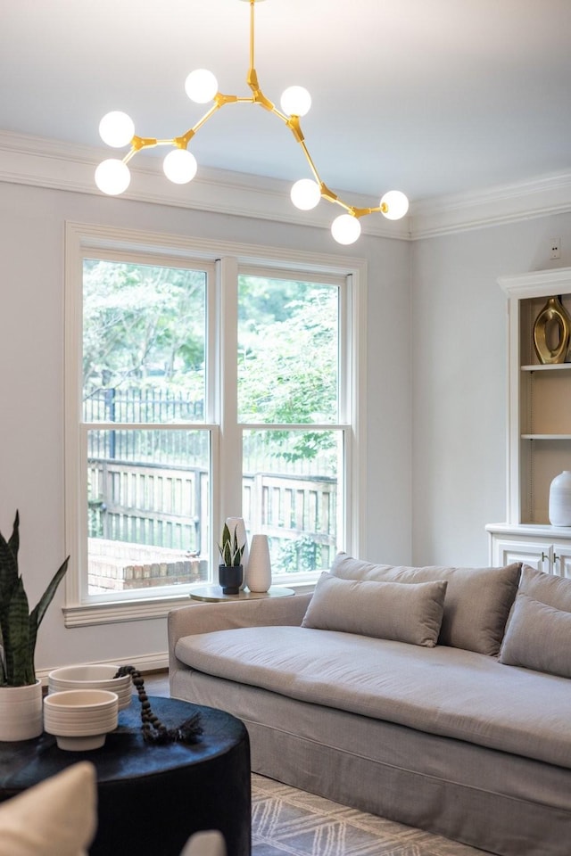 7075 Willowick Dr, Brentwood, TN 37027 - living area featuring crown molding, a chandelier, and healthy amount of natural light