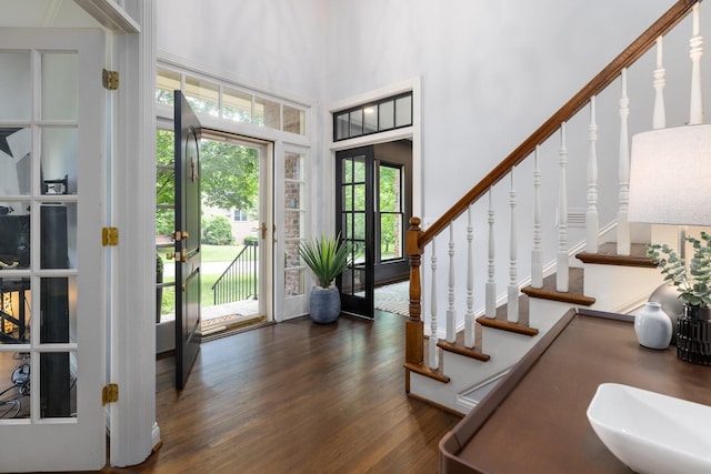 7075 Willowick Dr, Brentwood, TN 37027 - foyer entrance featuring dark wood-type flooring, stairs, and a high ceiling