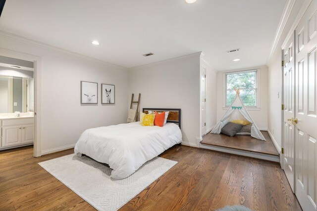 7075 Willowick Dr, Brentwood, TN 37027 - bedroom with wood finished floors, ornamental molding, recessed lighting, and connected bathroom