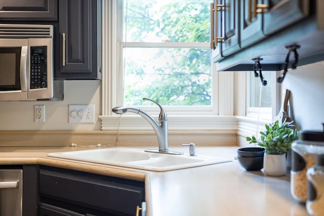 7075 Willowick Dr, Brentwood, TN 37027 - kitchen view of appliances with stainless steel finishes and light countertops