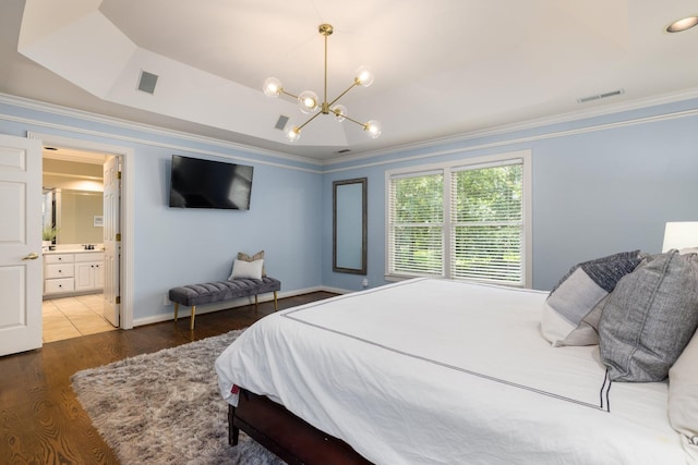 7075 Willowick Dr, Brentwood, TN 37027 - bedroom featuring a chandelier, wood finished floors, ornamental molding, and ensuite bathroom