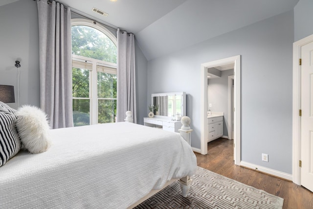 7075 Willowick Dr, Brentwood, TN 37027 - bedroom featuring dark wood-type flooring, lofted ceiling, and ensuite bathroom