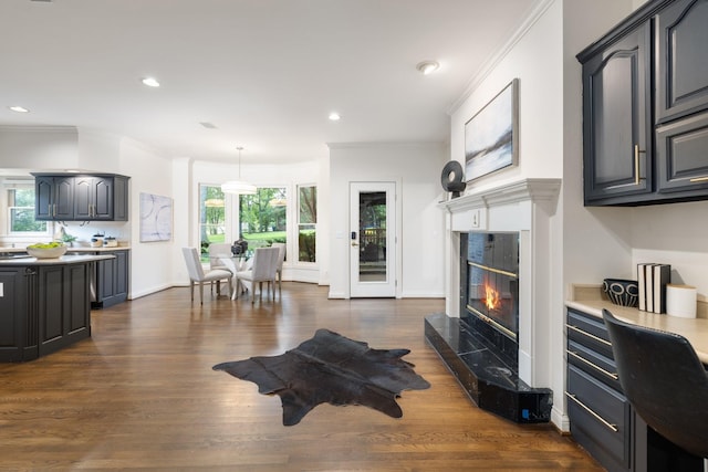 7075 Willowick Dr, Brentwood, TN 37027 - living area with a premium fireplace, ornamental molding, dark wood-style flooring, and recessed lighting