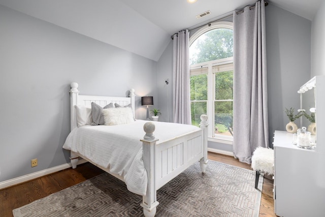 7075 Willowick Dr, Brentwood, TN 37027 - bedroom with vaulted ceiling and wood finished floors