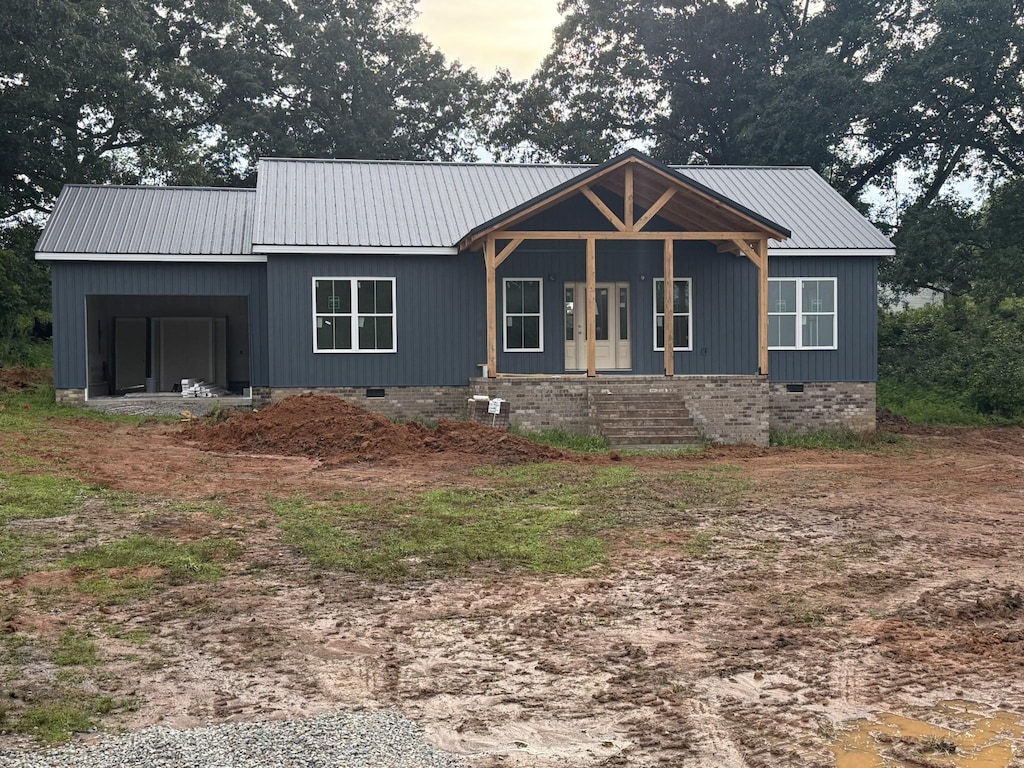 1166 Dugout Rd, Summertown, TN 38483 - view of front of house featuring crawl space and a metal roof