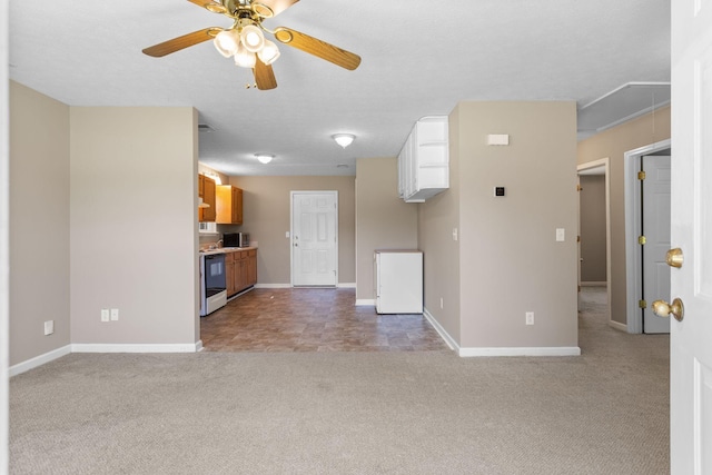 7215 Horn Tavern Rd, Fairview, TN 37062 - unfurnished living room featuring attic access, light colored carpet, and ceiling fan