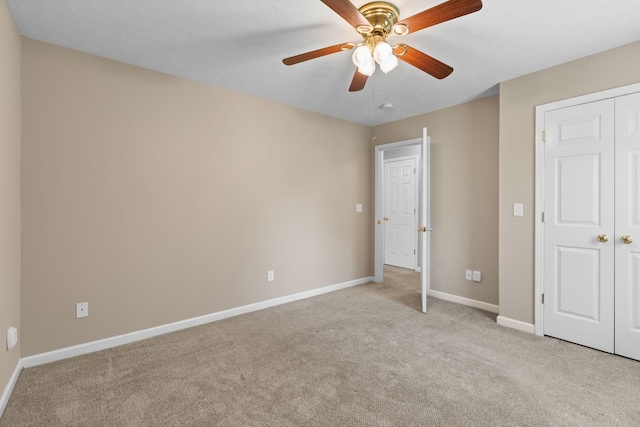 7215 Horn Tavern Rd, Fairview, TN 37062 - unfurnished bedroom featuring carpet, ceiling fan, and a closet