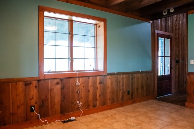7030 Dodson Branch Rd, Cookeville, TN 38501 - entrance foyer with a wainscoted wall, healthy amount of natural light, wood walls, and beam ceiling