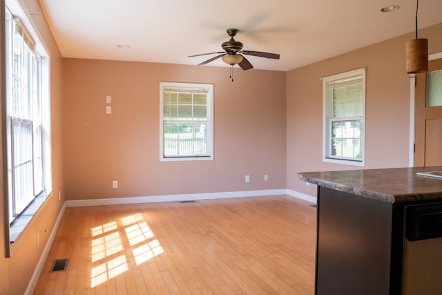7030 Dodson Branch Rd, Cookeville, TN 38501 - kitchen with light wood-style floors, healthy amount of natural light, ceiling fan, dark countertops, and recessed lighting