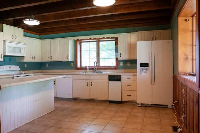 7030 Dodson Branch Rd, Cookeville, TN 38501 - kitchen with white appliances, light countertops, beamed ceiling, and light tile patterned floors