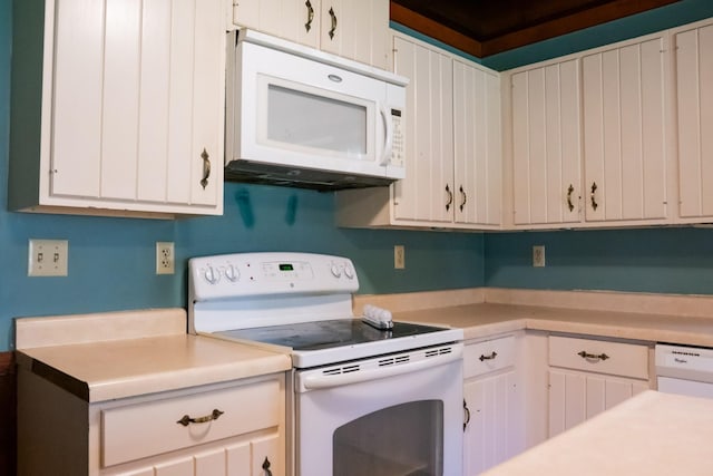 7030 Dodson Branch Rd, Cookeville, TN 38501 - kitchen with white appliances, light countertops, and white cabinetry