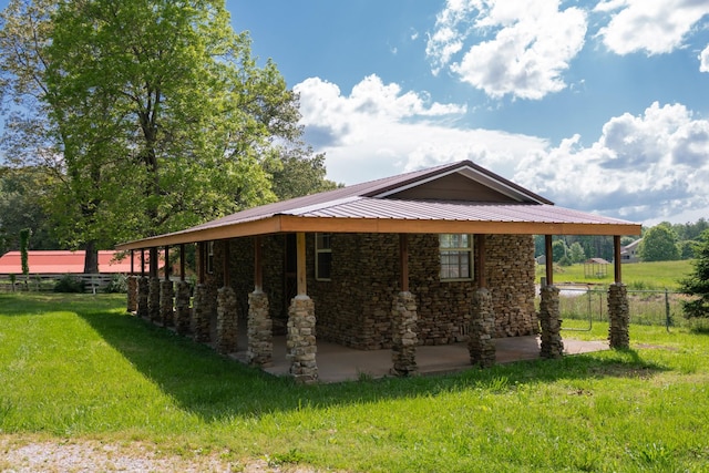 7030 Dodson Branch Rd, Cookeville, TN 38501 - view of side of property featuring stone siding and a metal roof