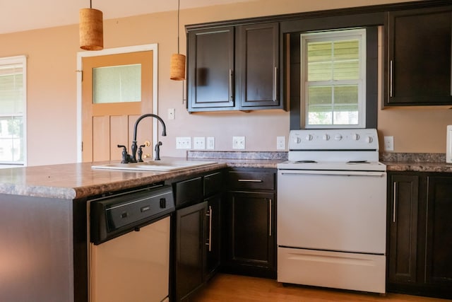 7030 Dodson Branch Rd, Cookeville, TN 38501 - kitchen with white electric range, light wood-style floors, a peninsula, dishwasher, and pendant lighting