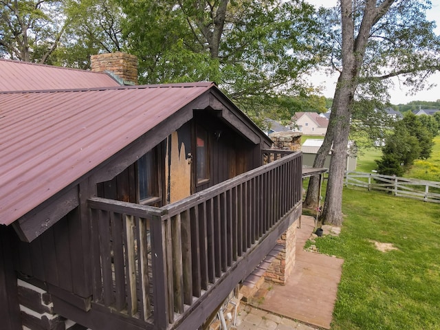 7030 Dodson Branch Rd, Cookeville, TN 38501 - view of side of home with a chimney and a metal roof