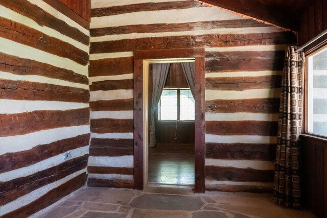 7030 Dodson Branch Rd, Cookeville, TN 38501 - staircase with wood walls and plenty of natural light