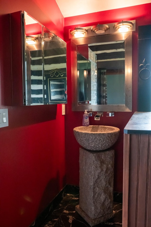 7030 Dodson Branch Rd, Cookeville, TN 38501 - bathroom featuring marble look tiles and vanity