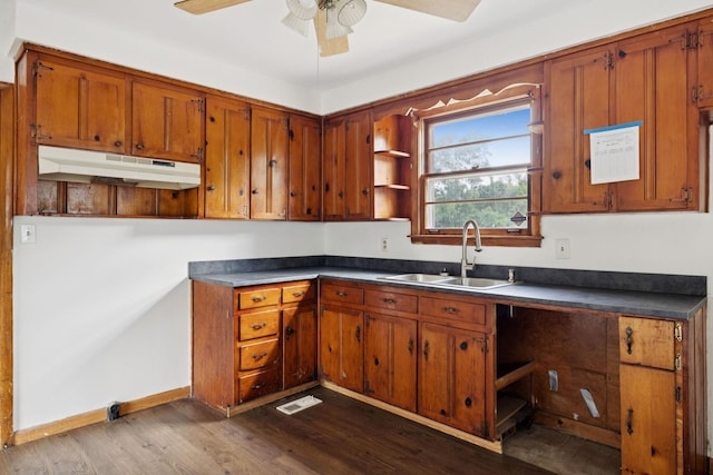 1421 Lakeview Rd, Clarksville, TN 37040 - kitchen featuring under cabinet range hood, open shelves, ceiling fan, dark wood-style flooring, and brown cabinetry