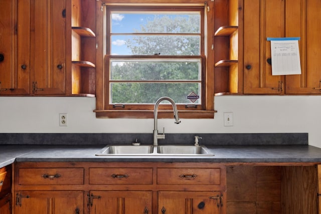 1421 Lakeview Rd, Clarksville, TN 37040 - kitchen with open shelves, brown cabinets, and dark countertops