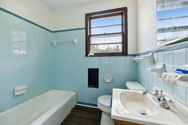 1421 Lakeview Rd, Clarksville, TN 37040 - full bath featuring wood finished floors, tile walls, vanity, and wainscoting