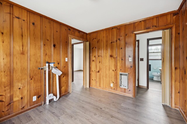 1421 Lakeview Rd, Clarksville, TN 37040 - unfurnished room with wood finished floors, heating unit, and wood walls