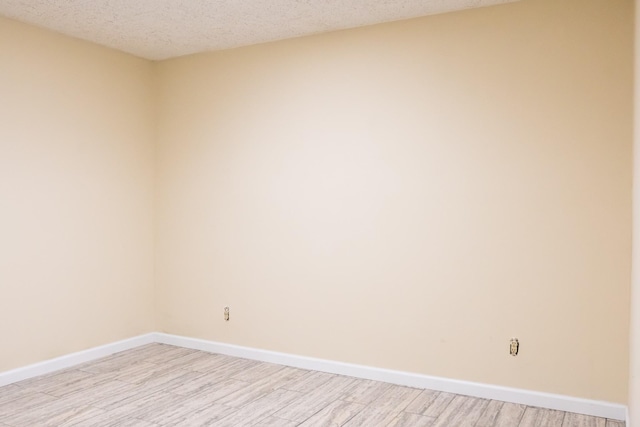 745 Contraband Ln, Cookeville, TN 38501 - spare room featuring light wood-type flooring and a textured ceiling
