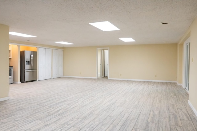 745 Contraband Ln, Cookeville, TN 38501 - unfurnished room featuring light wood-style flooring and a textured ceiling