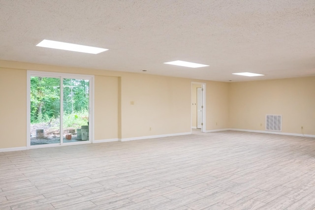 745 Contraband Ln, Cookeville, TN 38501 - unfurnished room featuring a textured ceiling and light wood-type flooring