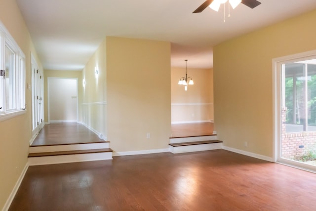 745 Contraband Ln, Cookeville, TN 38501 - empty room featuring wood finished floors, a ceiling fan, and a chandelier
