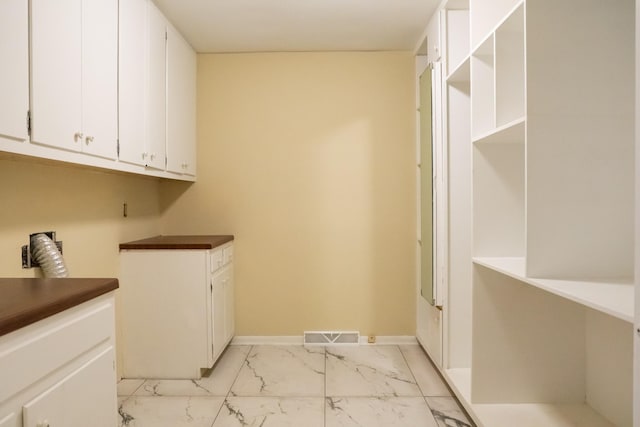 745 Contraband Ln, Cookeville, TN 38501 - washroom with light marble finish floors and cabinet space