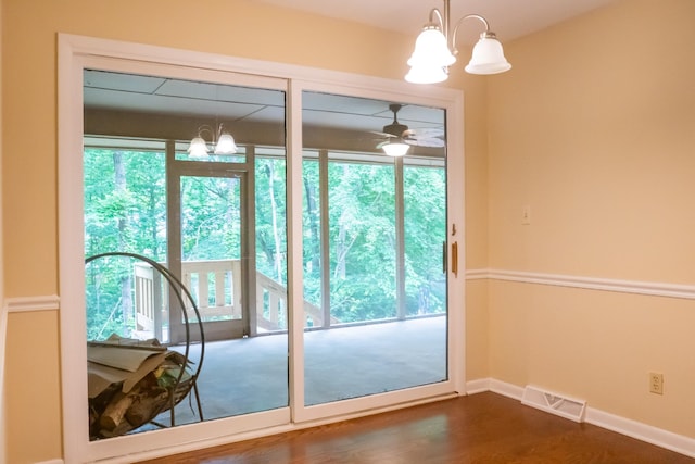 745 Contraband Ln, Cookeville, TN 38501 - doorway to outside with a chandelier, dark wood-style flooring, and ceiling fan