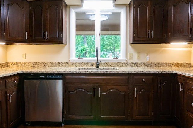 745 Contraband Ln, Cookeville, TN 38501 - kitchen with stainless steel dishwasher, dark brown cabinetry, and light stone countertops