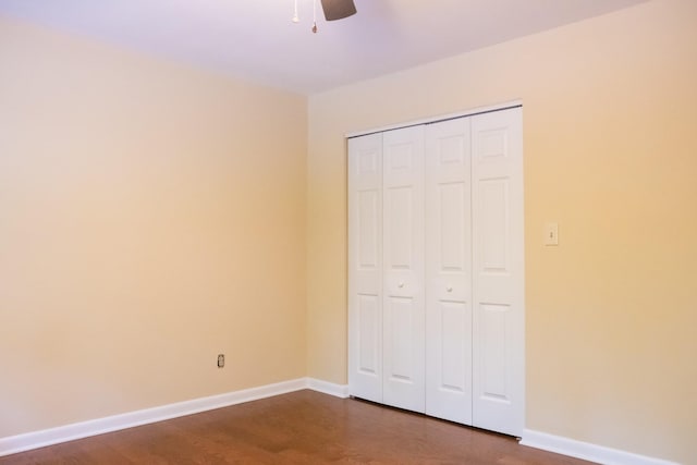 745 Contraband Ln, Cookeville, TN 38501 - unfurnished bedroom with dark wood-type flooring, a closet, and a ceiling fan