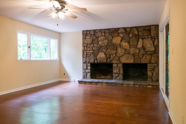 745 Contraband Ln, Cookeville, TN 38501 - unfurnished living room with a stone fireplace, wood finished floors, and ceiling fan