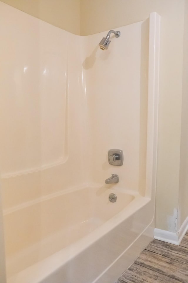 745 Contraband Ln, Cookeville, TN 38501 - bathroom with shower / tub combination and wood finished floors