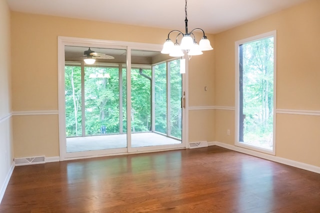 745 Contraband Ln, Cookeville, TN 38501 - empty room with plenty of natural light, dark wood-style flooring, and a chandelier
