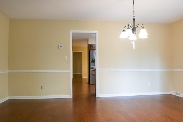 745 Contraband Ln, Cookeville, TN 38501 - spare room featuring wood finished floors and a chandelier