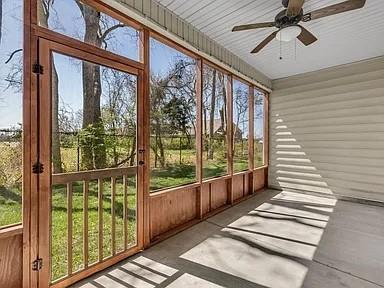 4437 Sunday Silence Way, Murfreesboro, TN 37128 - unfurnished sunroom featuring ceiling fan and plenty of natural light